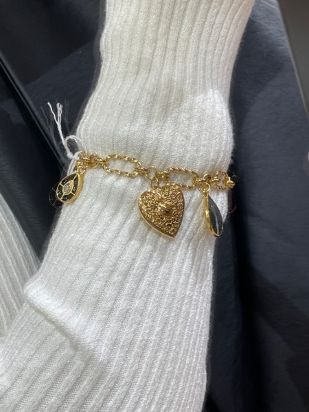 Gold chain bracelet with charms 