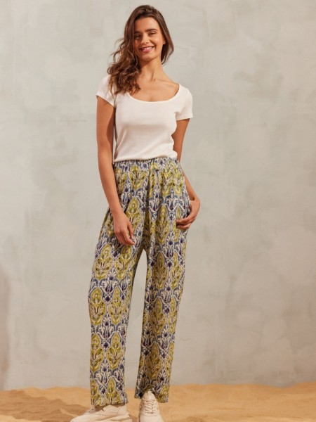 Floral printed μουσταρδί–μωβ ψηλόμεσο carrot-fit παντελόνι HALINA σε ίσια γραμμή, πλαϊνές τσέπες και λάστιχο στη μέση namaste 