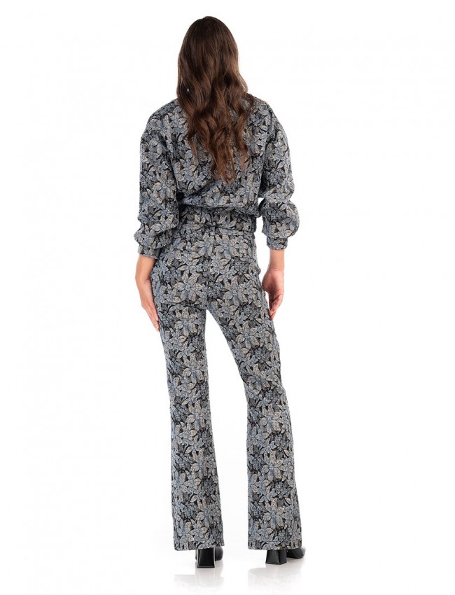 Floral printed μπλε ψηλόμεσο παντελόνι καμπάνα, με χρυσοτυπία, πλάγιες τσέπες και κλείσιμο με κουμπί και κρυφό φερμουάρ μπροστά We coss 