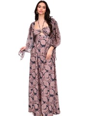 Εμπριμέ μαύρο αμάνικο maxi strapless φόρεμα με χρυσό κοχύλι και τρύπα στο μπούστο, δέσιμο με κορδόνι στον λαιμό και κλείσιμο με φερμουάρ και λάστιχο στην πλάτη We Coss