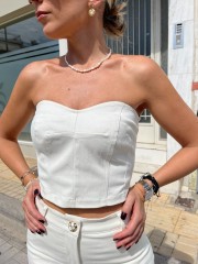 Βανίλια strapless ελαστική μπλούζα-μπούστο, με καστίσματα και κλείσιμο με χρυσό φερμουάρ στην πλάτη We Coss