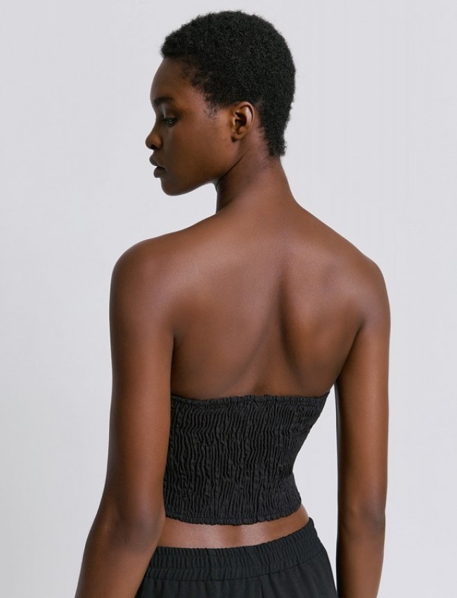 Μαύρη strapless μπλούζα με λάστιχο σφηκοφωλιά στην πλάτη και κλείσιμο με φερμουάρ στο πλάι Access 