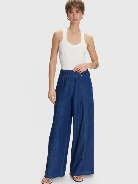 Blue Jean tencel ψηλόμεση παντελόνα με λάστιχο πίσω στη μέση, χαλαρή γραμμή, πλαϊνές τσέπες, διακοσμητικά γαζιά και κλείσιμο με κρυφό φερμουάρ στο πλάι ale 