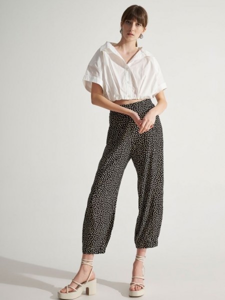 Μαύρο πουά slouchy-fit παντελόνι με πλαϊνές τσέπες και φαρδιά μπάσκα με λάστιχο και φερμουάρ στο πλάι Ale 