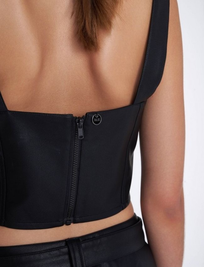 Μαύρο faux leather εφαρμοστό cropped μπούστο με λεπτές τιράντες, μύτη-τελείωμα στο μπροστινό μέρος και κλείσιμο με φερμουάρ πίσω Ale