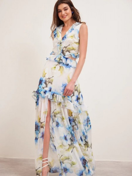 Floral printed λευκό αμάνικο maxi φόρεμα με βολάν σε επίπεδα, ανοίγματα στα πλαϊνά και μπροστινό σκίσιμο  Enzzo