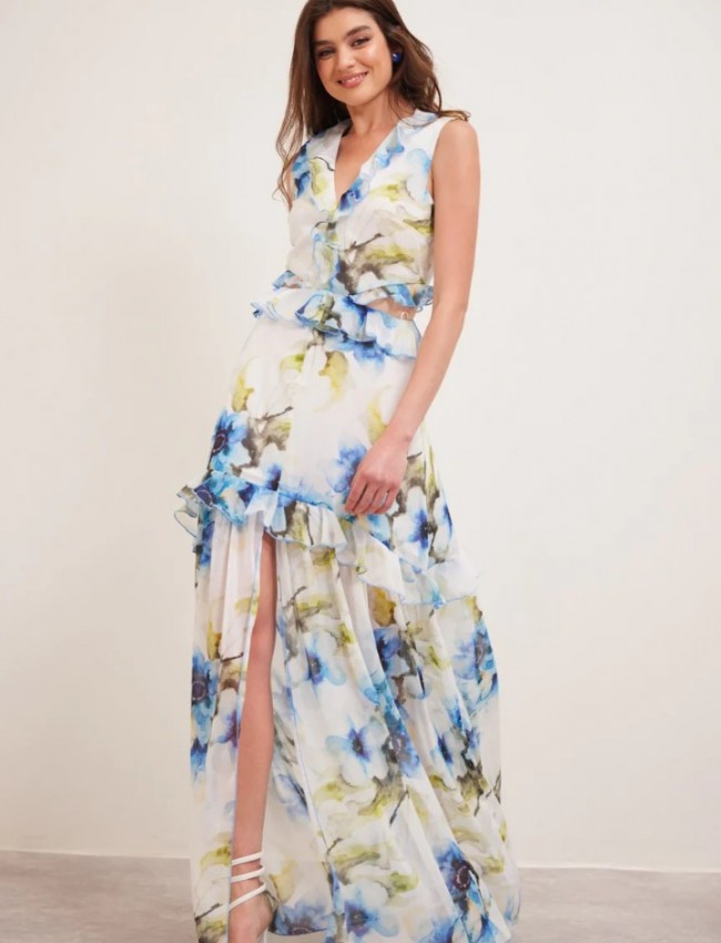Floral printed λευκό αμάνικο maxi φόρεμα με βολάν σε επίπεδα, ανοίγματα στα πλαϊνά και μπροστινό σκίσιμο  Enzzo