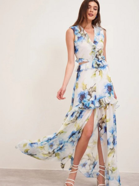 Floral printed λευκό αμάνικο maxi φόρεμα με βολάν σε επίπεδα, ανοίγματα στα πλαϊνά και μπροστινό σκίσιμο  Enzzo