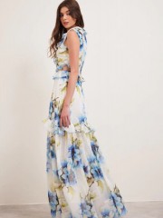 Floral printed λευκό αμάνικο maxi φόρεμα με βολάν σε επίπεδα, ανοίγματα στα πλαϊνά και μπροστινό σκίσιμο  Enzzo