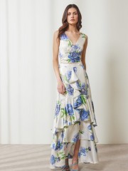 Floral printed μπλε μεταλλιζέ maxi Aubrey φούστα, με βολάν σε επίπεδα, κάθετο βολάν με μπροστινό σκίσιμο, λάστιχο πίσω στην μέση και κλείσιμο με κρυφό φερμουάρ στο πλάι Enzzo  