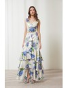Floral printed μπλε μεταλλιζέ maxi Aubrey φούστα, με βολάν σε επίπεδα, κάθετο βολάν με μπροστινό σκίσιμο, λάστιχο πίσω στην μέση και κλείσιμο με κρυφό φερμουάρ στο πλάι Enzzo  