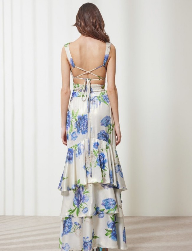 Floral printed μπλε μεταλλιζέ maxi Aubrey φούστα, με βολάν σε επίπεδα, κάθετο βολάν με μπροστινό σκίσιμο, λάστιχο πίσω στην μέση και κλείσιμο με κρυφό φερμουάρ στο πλάι Enzzo  