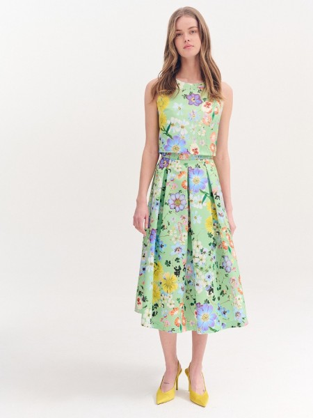 Floral printed πράσινη ψηλόμεση midi σατέν φούστα, με πιέτες, σταθερό ζωνάκι στην μέση και κλείσιμο με κρυφό φερμουάρ πίσω Forel