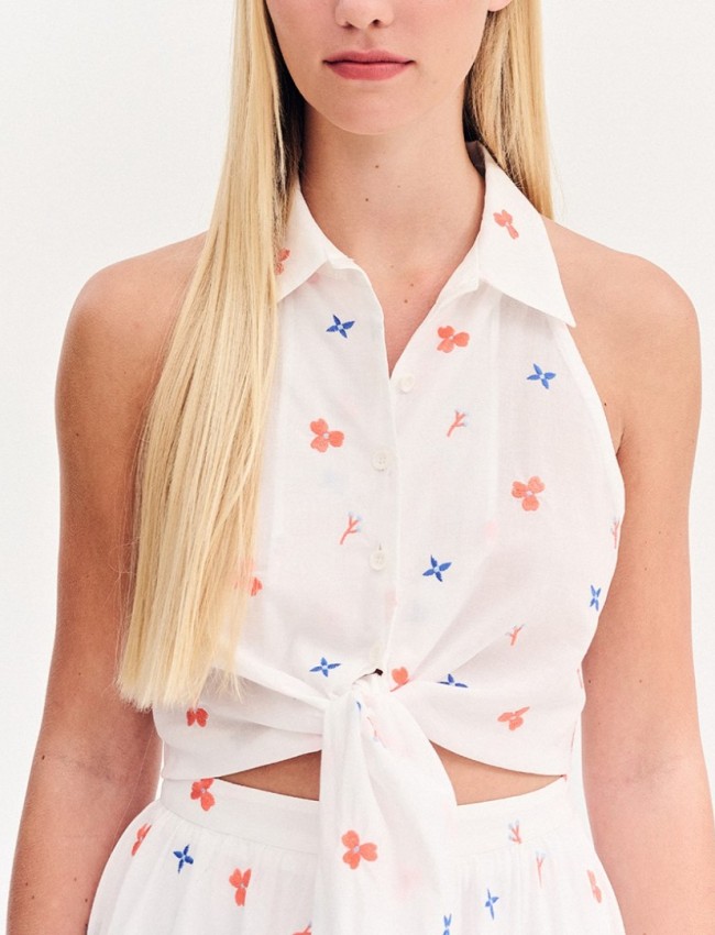 Floral printed λευκό αμάνικο πουκάμισο, με πέτο γιακά, παρτούς ώμους κλείσιμο με κουμπιά μπροστά και μη αποσπώμενη ζώνη-δέσιμο Forel Case Study