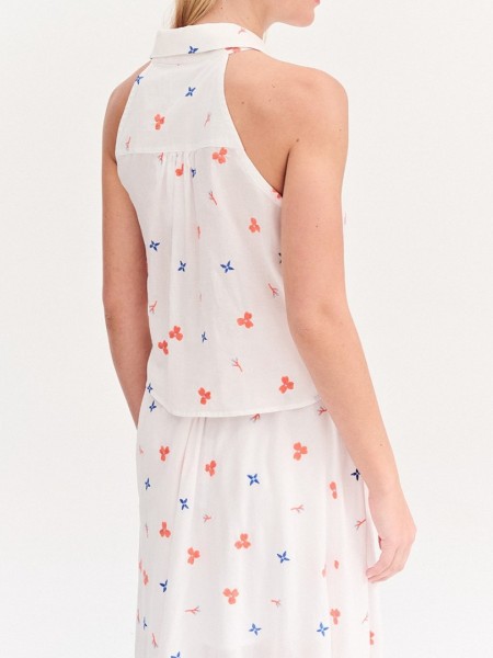 Floral printed λευκό αμάνικο πουκάμισο, με πέτο γιακά, παρτούς ώμους κλείσιμο με κουμπιά μπροστά και μη αποσπώμενη ζώνη-δέσιμο Forel Case Study