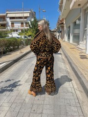 Εμπριμέ μαύρη ψηλόμεση cropped παντελόνα σε flocko ύφανση, λάστιχο στην μέση και μεγάλο βολάν στο τελείωμα Innocent