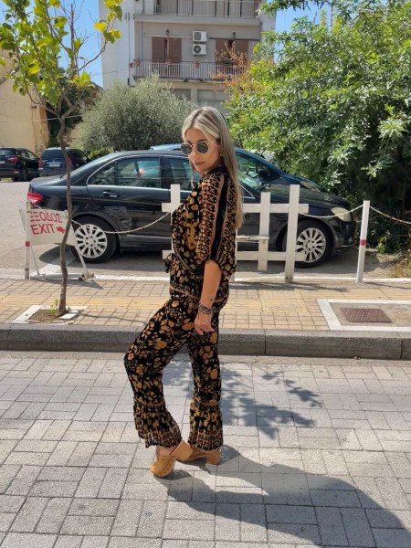 Εμπριμέ μαύρη ψηλόμεση cropped παντελόνα σε flocko ύφανση, λάστιχο στην μέση και μεγάλο βολάν στο τελείωμα Innocent