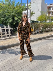 Εμπριμέ μαύρη ψηλόμεση cropped παντελόνα σε flocko ύφανση, λάστιχο στην μέση και μεγάλο βολάν στο τελείωμα Innocent